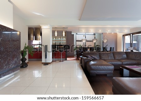 Kitchen, Living Room And Dining Room In Modern House
