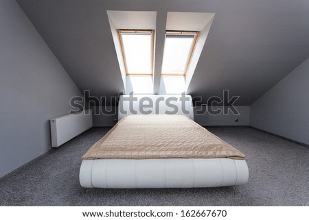 Urban apartment - white bed on the attic