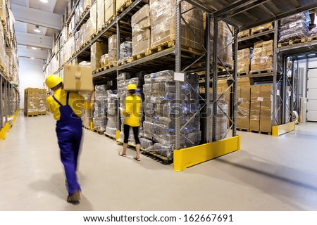 Warehouse Worker With Box And Manager Controlling Products