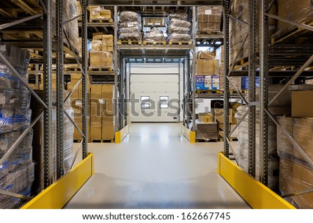 Entrance to a huge warehouse with metal rack