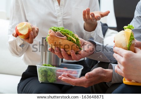 Discussion about finances during the break from work with meal