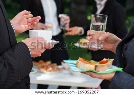Business People At The Meeting At The Lunch Buffet