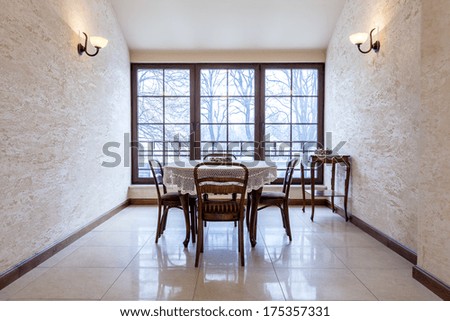 Beautiful elegant old-fashioned dining room in luxury stylish mansion