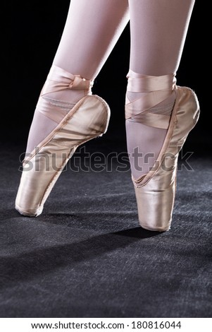 A close up of ballerina\'s pointe shoes
