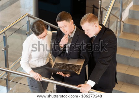 Business people with laptop at the office building