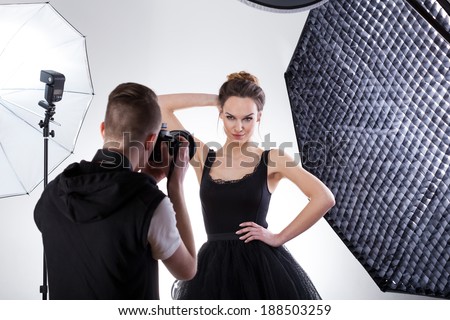 Professional fashion photography in studio with softboxes