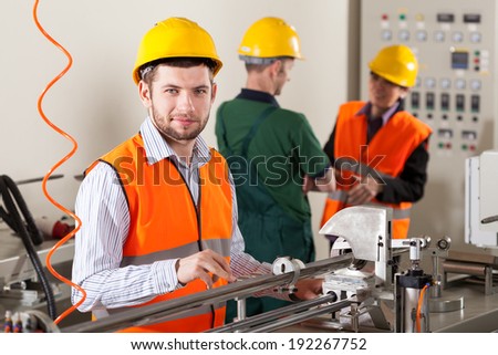 Male production workers working during production process