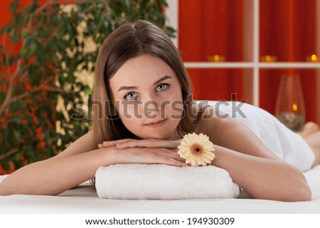 Portrait of a pretty young girl at spa salon