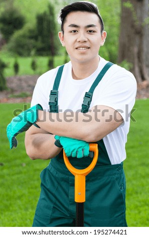 Vertical view of an asian gardener during work