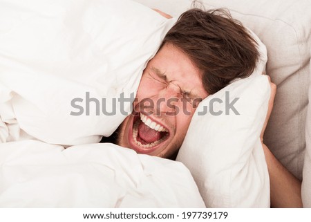 A furious man reluctant to wake up in the morning