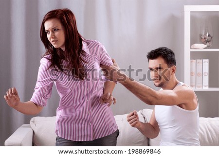 Horizontal view of a violence in young marriage