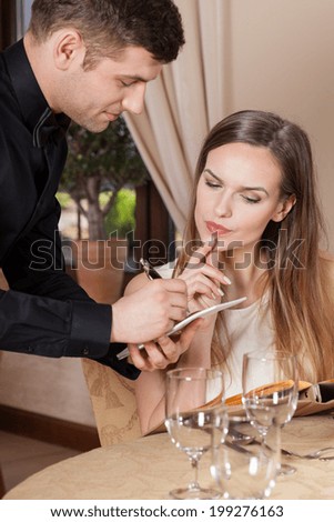 Woman placing an order in a restaurant