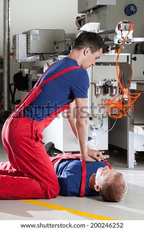 Resuscitation after accident in a factory, vertical
