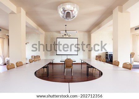 Interior of a room with conference table