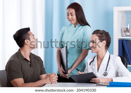 Horizontal view of Asian patient during medical consultation