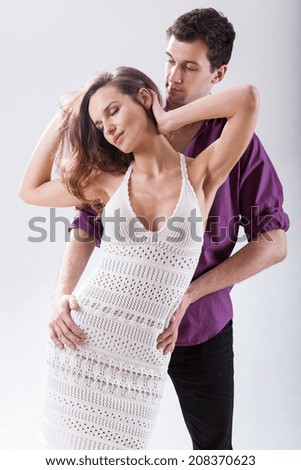 Portrait of young couple in sexy dance