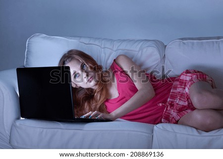 Sleepless girl during surfing the internet, horizontal