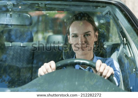 Woman goes to work by car, horizontal