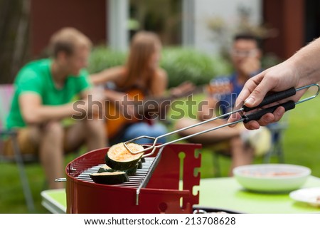 Horizontal view of zucchini on a barbecue