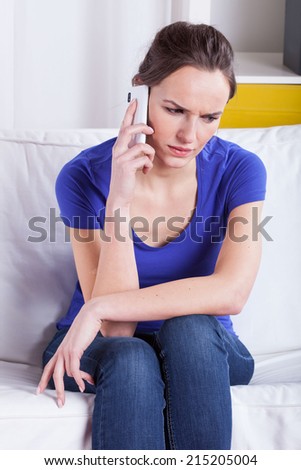 Angry woman during mobile phone call