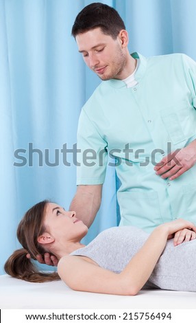 Patient with pain of neck visiting physiotherapist