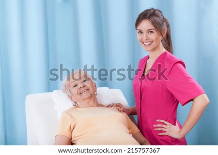 Patient lying on treatment couch and her physiotherapist