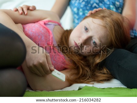 Friend comfort crying underage girl who is pregnant