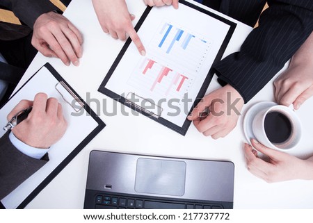 Female hand reading diaphragms during business appointment