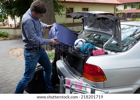 Horizontal view of car trunk full of luggage