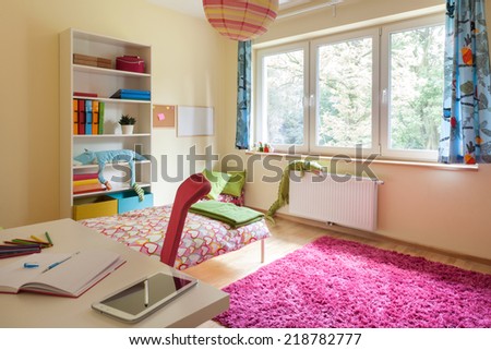 Interior of a children room with big window