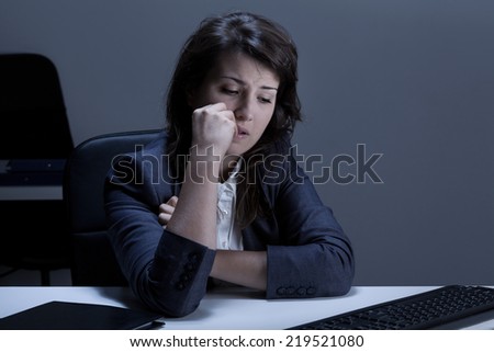 View of sad woman in the office