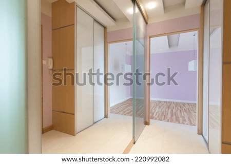 Modern hall with mirrors on the wall