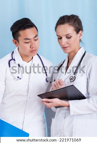 View of couple of doctors during job