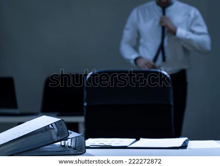 Businessman preparing to work in his office