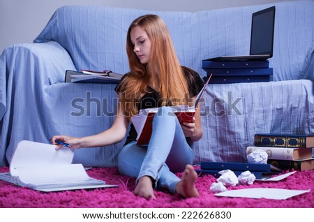 Student learning to hard exam in her room