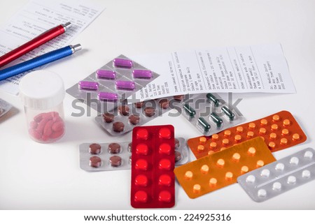 Table with prescriptions and various pharmaceuticals