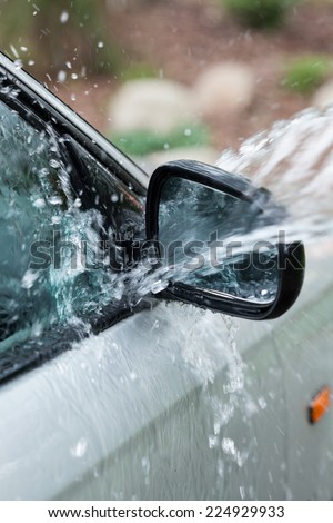 Bucket of water on the wing mirror