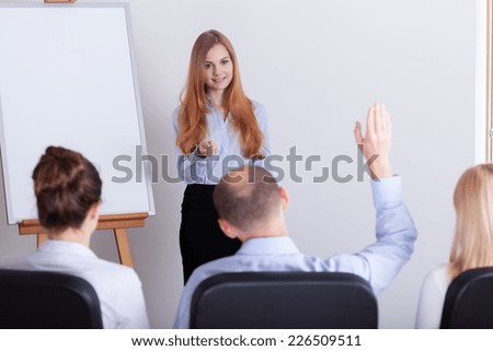 Man asking the question during the woman\'s lecture