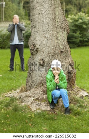Hide and seek game in the garden