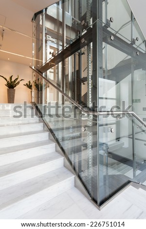 View of glass elevator in modern building