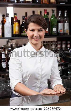 Young woman working at the hotel  bar