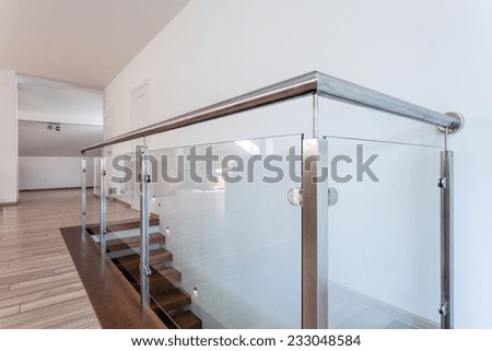 Bright space - a closeup of a silver glass barrier