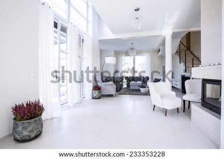 Modern living room with big garden windows