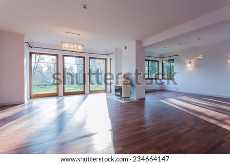 Bright spacious front room with stove