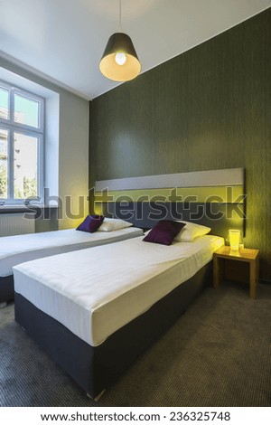 Beauty hotel room interior with two single beds