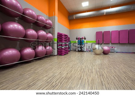 Interior of equipped gym at fitness center