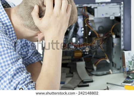 Man fixing computer