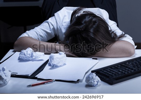 View of woman sleeping in the office
