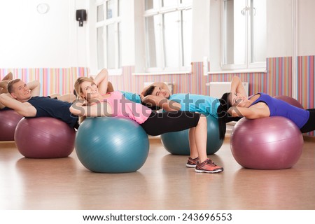 Close-up of pilates exercise with fitness balls Close-up of pilates exercise with fitness balls