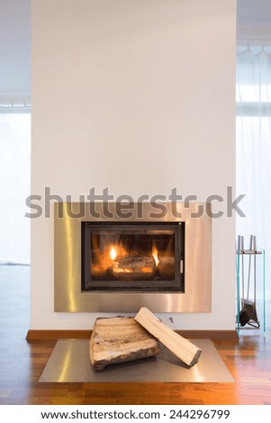 Close-up of burning fireplace in detached house